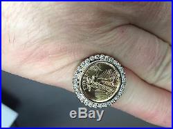 14K Gold 21 MM COIN RING with a 22K 1/10 OZ AMERICAN EAGLE COIN WITH. 25 TCW